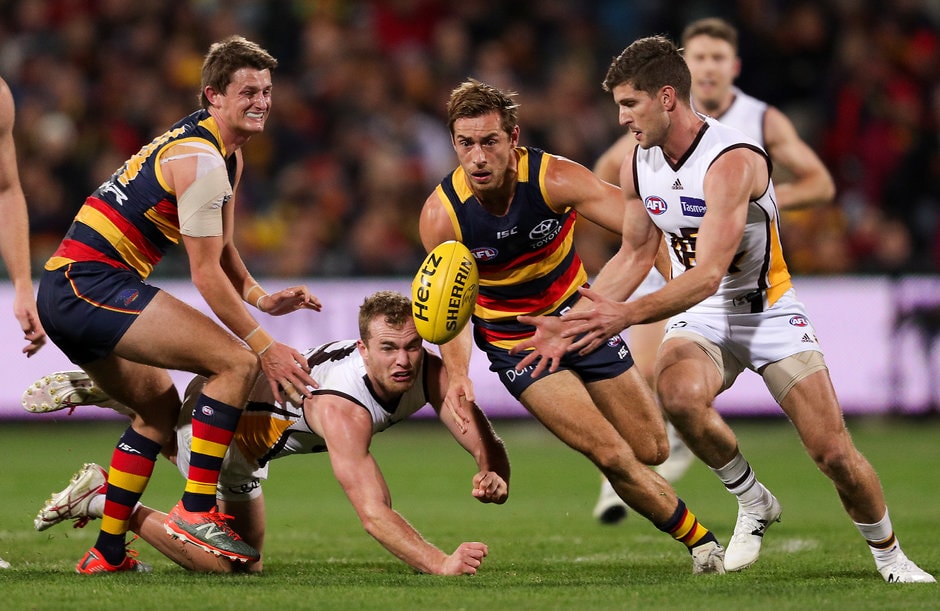 AFL 2017 Round 14 - Adelaide v Hawthorn ADELAIDE, AUSTRALIA - JUNE 22: Matt Crouch and Richard Douglas of the Crows clash with Tom Mitchell and Luke Breust of the Hawks during the 2017 AFL round 14 match between the Adelaide Crows and the Hawthorn Hawks at the Adelaide Oval on June 22, 2017 in Adelaide, Australia. (Photo by AFL Media)